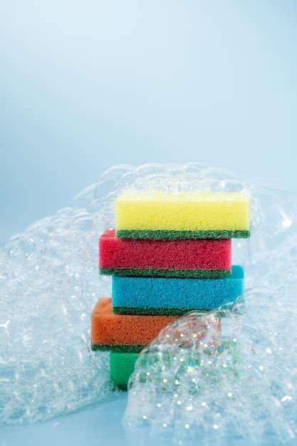 Premium Photo Multicolored Sponges For Washing Dishes In Foam The