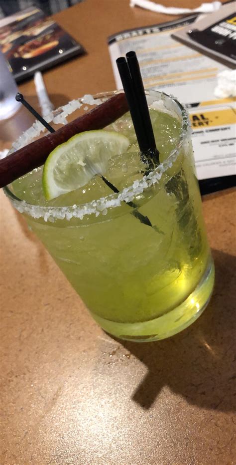 This drink at Buffalo Wild Wings has Mountain Dew and tequila....and is served with a slim Jim ...