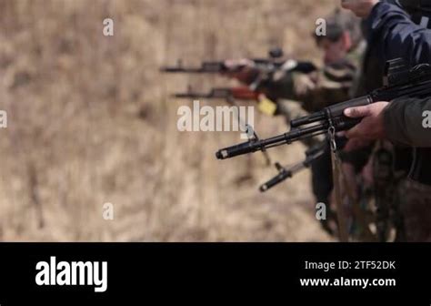 This video shows a men shooting a shooting range target from a machine ...