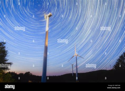 A series of stacked long exposures show the rotation of the earth around its northern polar axis ...