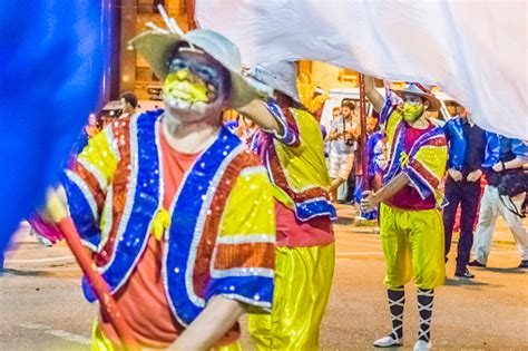 Costume Men With Flag Marching At Carnival Parade Of Uruguay Stock ...