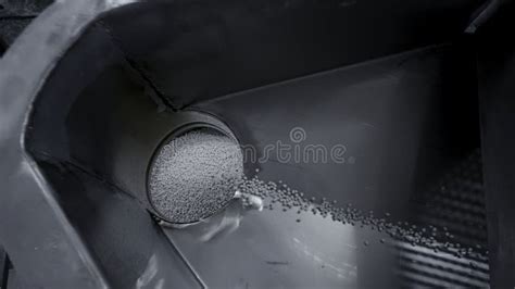 Pouring Pile Of Plastic Particles Creative Process Of Filling