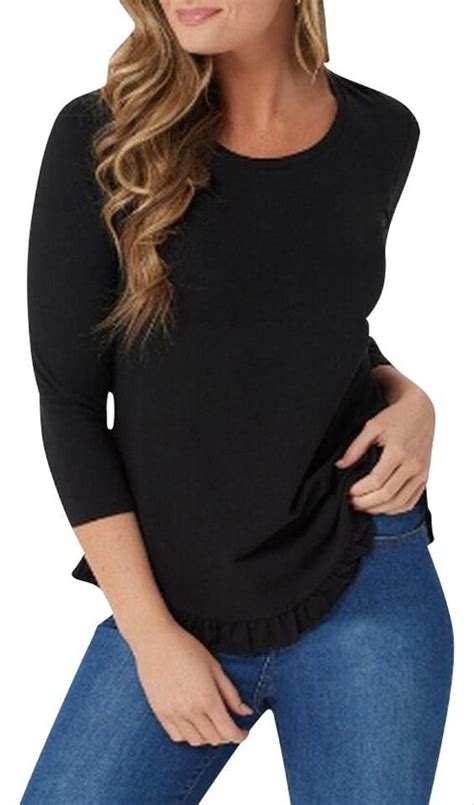 You Ll Look Your Best In This Flirty Knit Top That S Accented By A