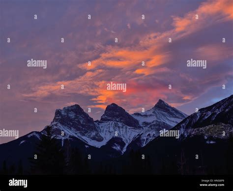 Sunrise On The Three Sisters Mountains In Canmore Alberta Canada