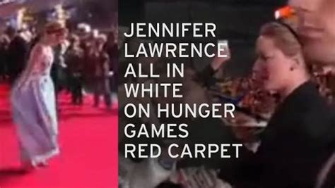 Jennifer Lawrence Puts Nude Hacking Scandal Behind Her As She Stuns In White On Mockingjay