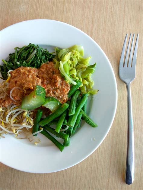 A plate of pecel stock photo. Image of seafood, typical - 202525700