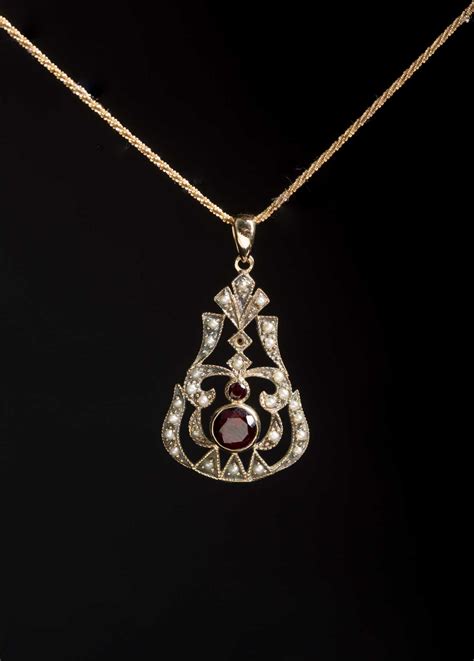 Yellow Gold Garnet And Seed Pearl Pendant