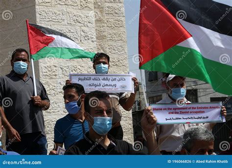 Palestinians Stage A Protest Against The Normalization Deal Between