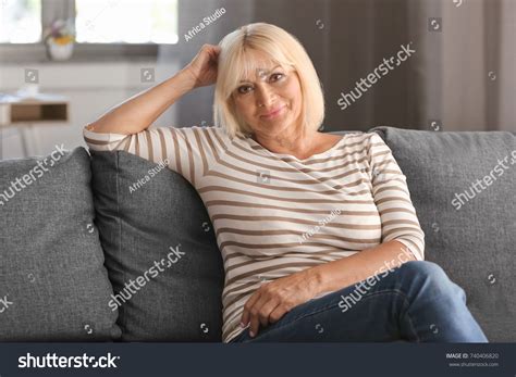 Attractive Mature Woman Sitting On Couch Stock Photo Shutterstock