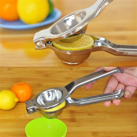 Jual ALAT PEMERAS JERUK LEMON STAINLESS TEBAL Action Perasan Lemon