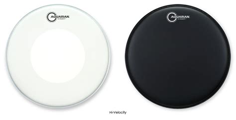 The Electronic Drum Head Is Shown Next To An Image Of A Black And White One