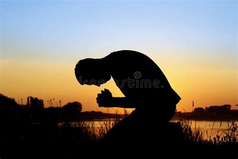 Silhouette man praying stock photo. Image of peaceful - 176761594