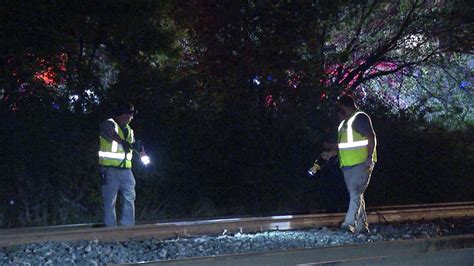 Woman Hospitalized After Rolling Vehicle Onto Train Tracks Along Loop 410