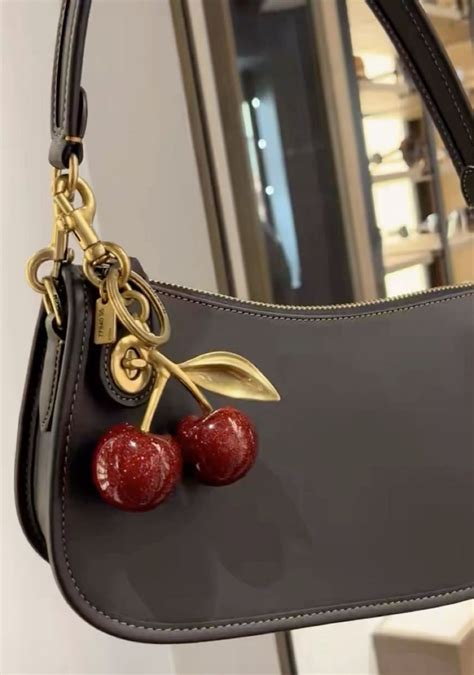 Coach Black Bag with Cherry Charm: A Comprehensive Guide – Coach #1