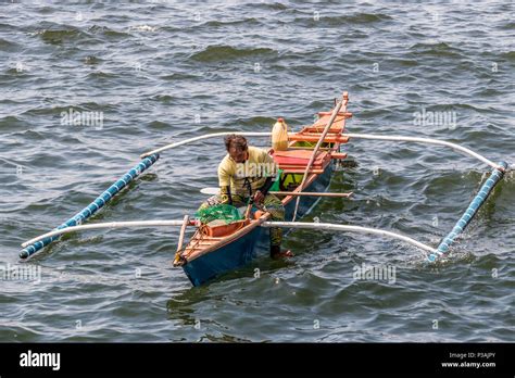 Fishing Off Coast Of Manila Philippines Stock Photo Alamy