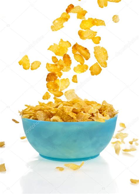 Flying To The Bowl Corn Flakes Isolated On White Background Stock