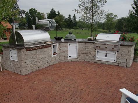 Custom Masonry Outdoor Kitchen With Smoker Green Egg Sink And Grill