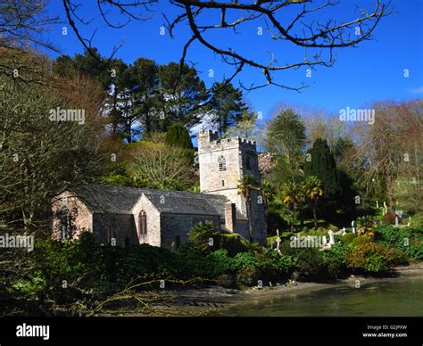 The Church Of St Just In Roseland Cornwall Stands On The Bank Of A