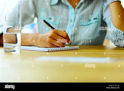 Closeup Portrait Of A Female Hand Writing On A Paper Stock Photo Alamy