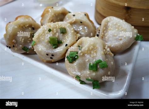 Shanghai Pan Fried Pork Dumpling Stock Photo Alamy