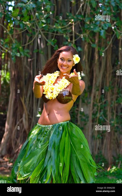 Female Hawaiian Hula Dancer Wearing Coconut Bikini Yellow Lei And