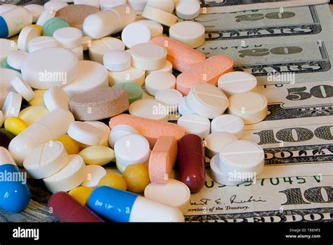 Pills On Dollar Money Isolated On Black Background Medicine Expenses