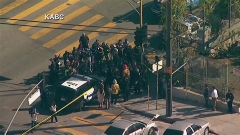 Police Take 12 Year Old Girl Into Custody After Shooting At La Middle School