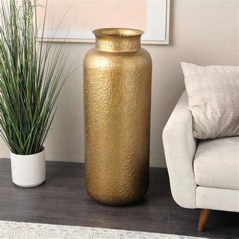 Litton Lane Gold Tall Textured Hammered Floor Metal Decorative Vase