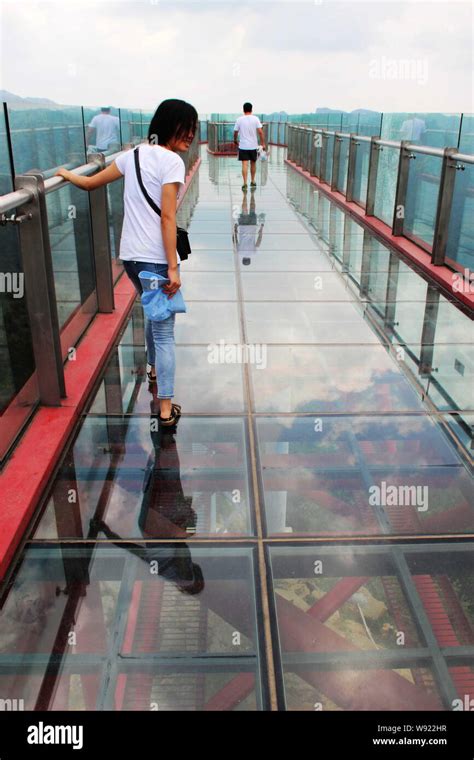 Tourists Walk On The Worlds Longest Glass Cantilever Bridge In The