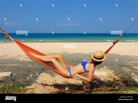 Woman In Hammock On Beach Stock Photo Alamy