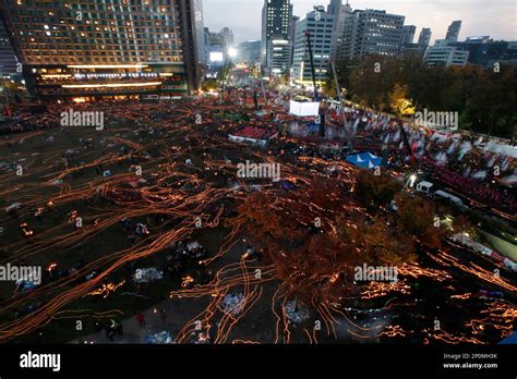 In This Photo Taken With A Long Exposure South Koreans March Toward