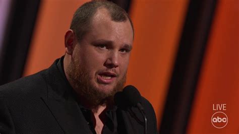 Luke Combs Accepts The Award For Entertainer Of The Year At Cma Awards