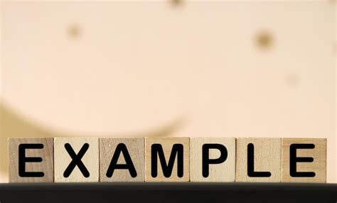 Premium Photo Example Word Made With Building Blocks Isolated On White