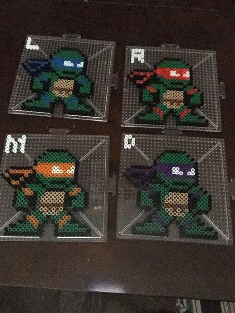 I did all 4 TMNT Here is a picture of them before Ironed. | Perler bead art, Iron beads, Perler ...