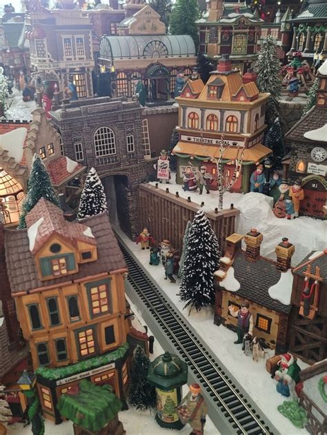 Christmas Village Display with Model Train Set