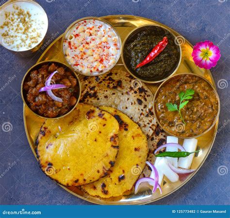 Punjabi Vegetarian Thaali Meals Served Traditionally In Brass Plate