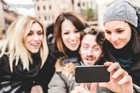 Group Of Happy Friends Taking A Selfie