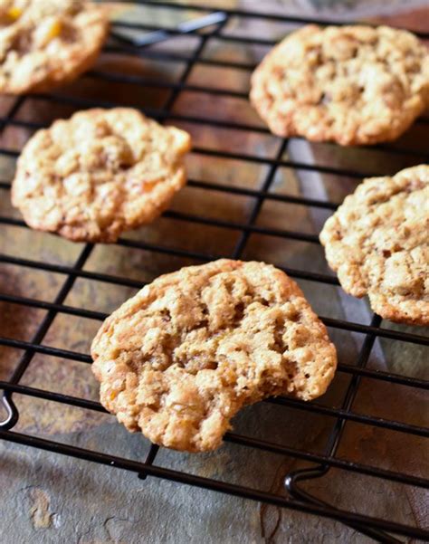 Several Cookies Are Cooling On A Wire Rack