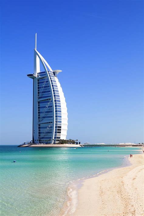 The iconic Burj Al Arab Hotel Photograph by Fraser Hall - Pixels