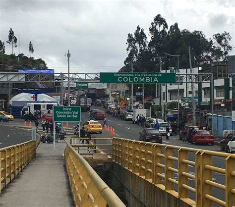 Crossing the Border from Ecuador to Colombia — Ricardo and Lorena