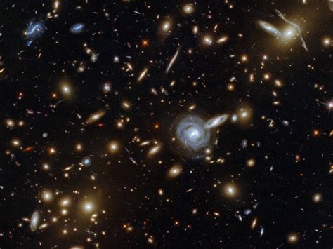 NASA's Hubble Telescope Captures Image Of Galaxy Cluster 3.5 Billion ...