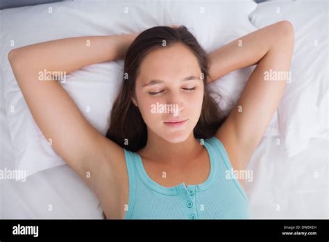 Woman Sleeping Peacefully In Bed Stock Photo Alamy