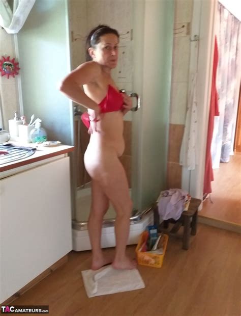 Mature Lady Diana Ananta Gets Undressed Before Taking A Shower