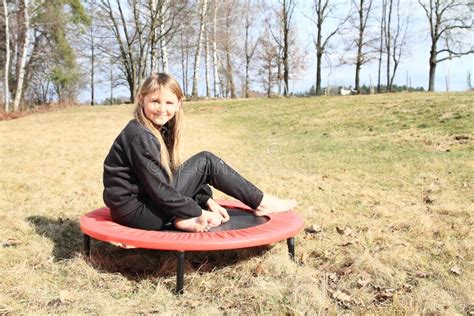 Barefoot Blond Girl Jumping On Trampoline Stock Image Image Of Enjoying Barefoot 92798291