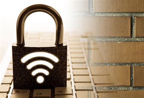 Padlock With Passwrod Wifi With The Computer Keyboard With Brick Wall