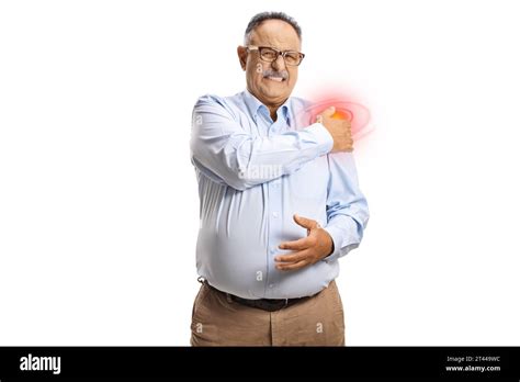 Mature Man In A Shirt With Pain In Shoulder Holding A Red Inflamed Spot