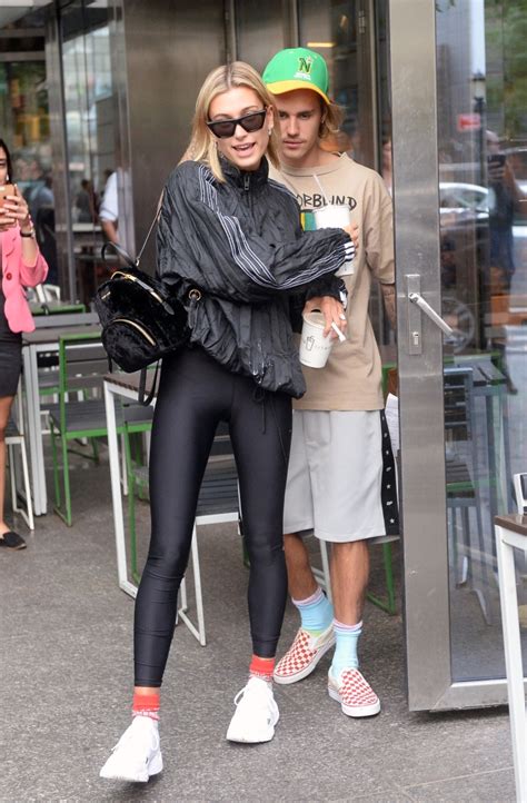 Hailey Baldwins Celine Edge Sunglasses And Adidas Falcons Slay Nyc