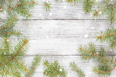 Premium Photo Christmas Wooden Background With Fir Tree Top View