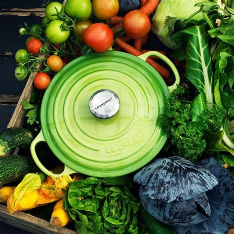 A Wooden Crate Filled With Lots Of Different Types Of Vegetables