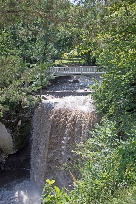 Waterfall and Bridge stock photo. Image of flows, bison - 75956586